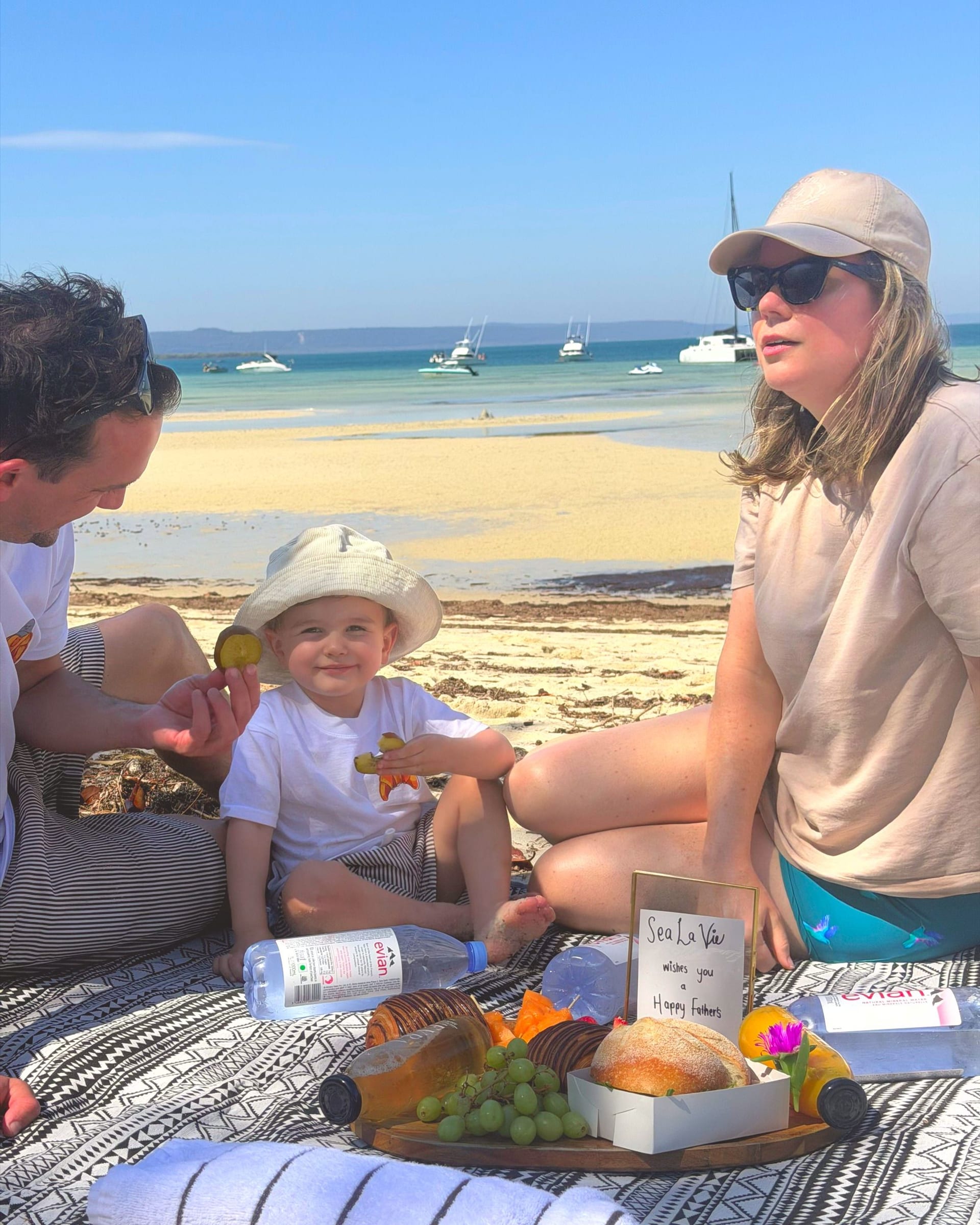 A family picnic on the sand at Moreton Island