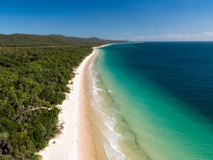 Boat on turquoise Moreton Bay waters