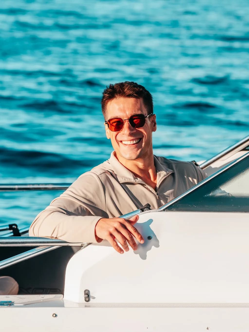Captain Jeremy Wolff at the helm of Sea La Vie on Moreton Bay