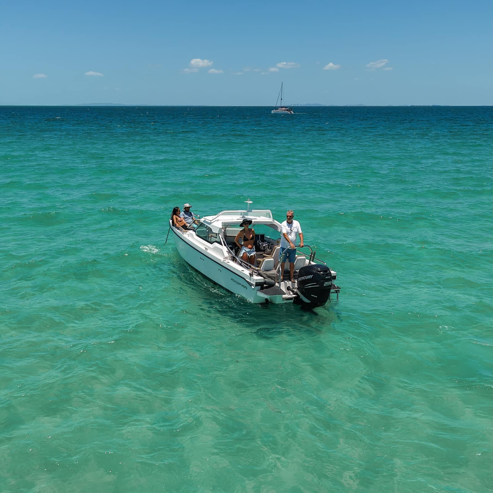 The Axopar 24 anchored off a secluded Moreton Bay sandbar from above